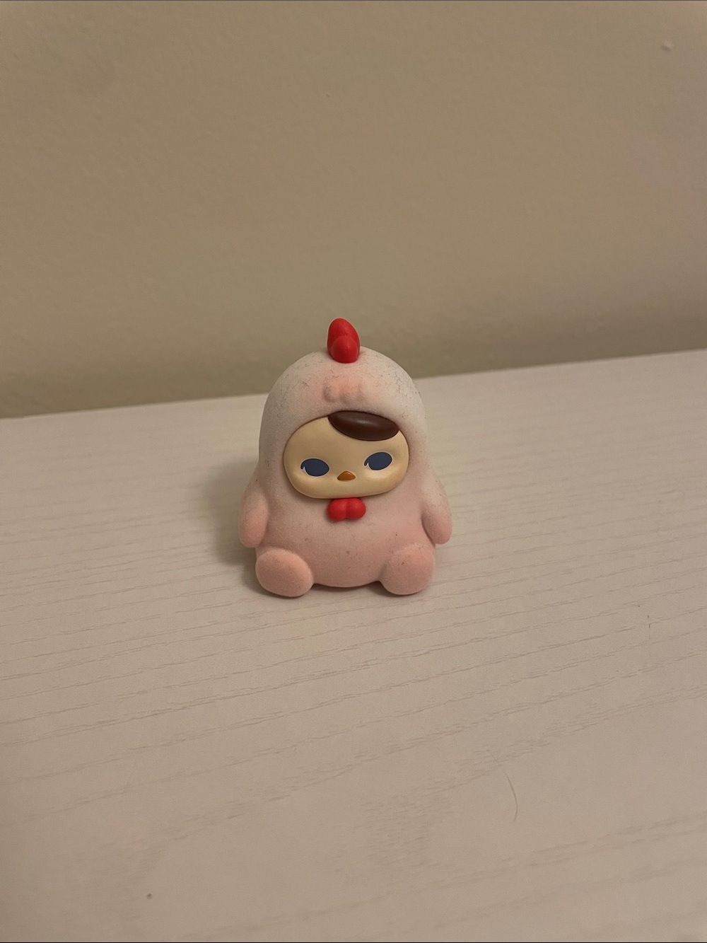 Cute flocked chicken pucky